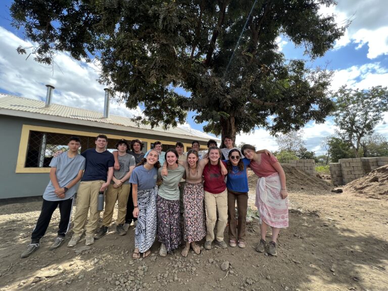 students-posing-group-photo-tanzania-stan