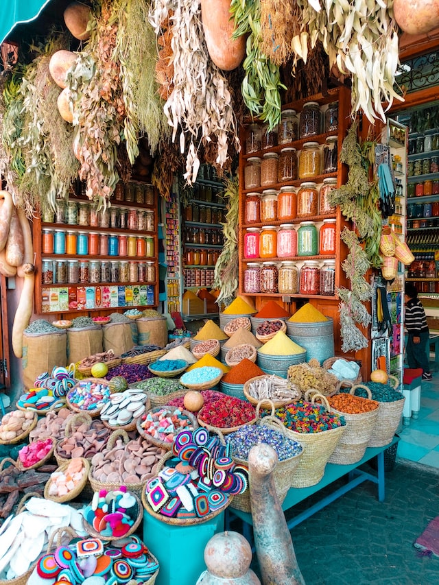 market stall in morocco with colorful spices and goods