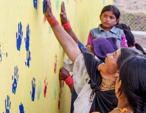 paint-handprints-yellow-wall-ecuador-cseca_zackzappone-781-4