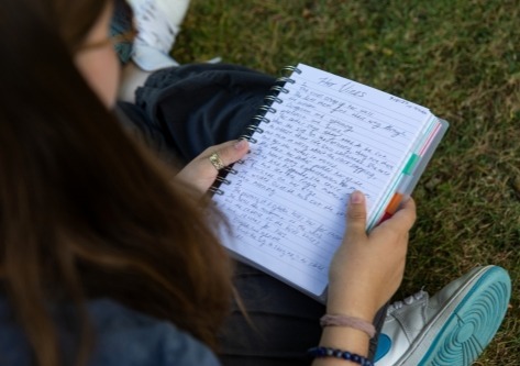 students-looking-at-notebook