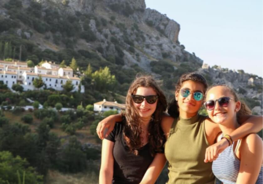 three-students-posing-spain-coast