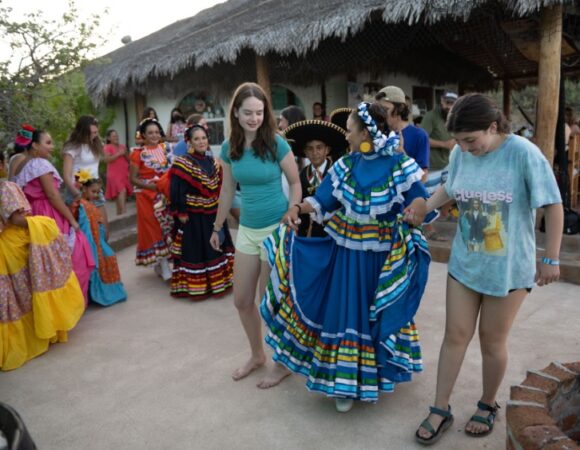 students-dancing-with-locals