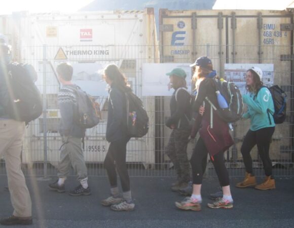 students walking touring power plant