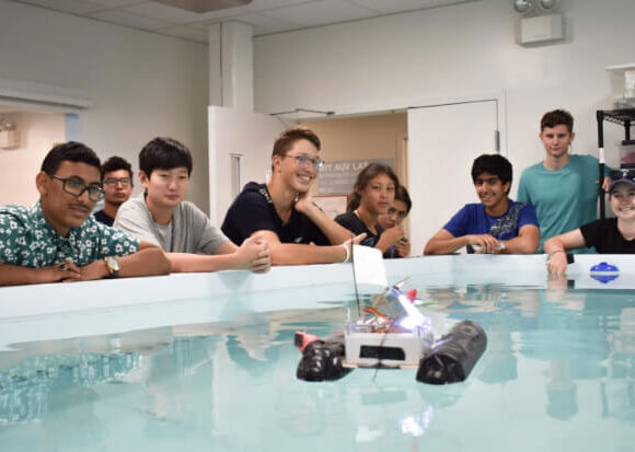 putney-students-posing-boat-robot