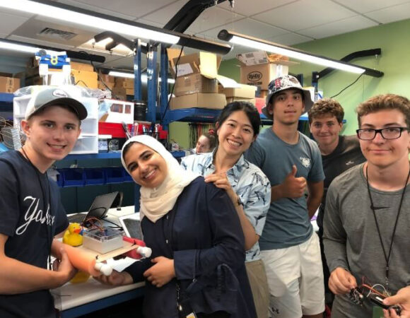 putney-students-holding-robot-boat