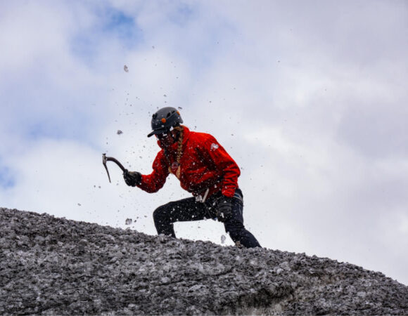 student-swinging-ice-axe-iceland