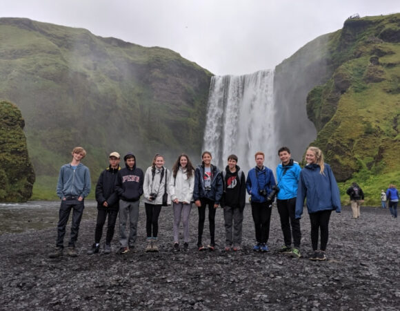 students-smiling-waterfall-iceland